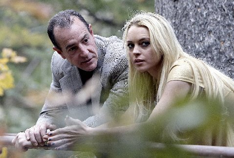 Above are Lindsay and Michael Lohan. This week the Lohan's were in the news 